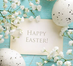 Easter decorations with banner that states "Happy Easter!"